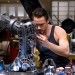 Tony Stark working on Iron Man's jet boots
